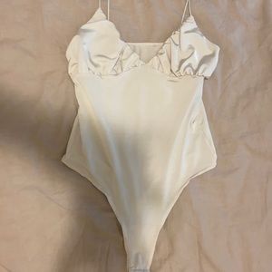 white satin bodysuit